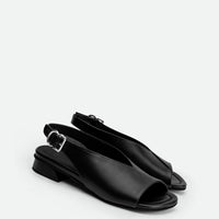 Christin Black Leather Slingbacks - Angled Side View - POEVE Collection