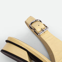Christin Cream Crinkled Patent Leather Slingbacks - Heel Close-up View - POEVE Collection