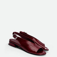 Christin Red Crinkled Patent Leather Slingbacks - Angled Side View - POEVE Collection