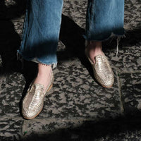 Carola Platinum Laminated Hand-Woven Leather Loafers, styled with frayed hem denim - POEVE Collection