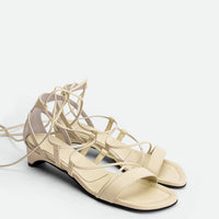 Muse Beige Leather Heel Lace-up Sandals - Angled Side View - POEVE Collection