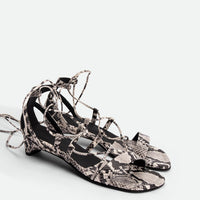 Muse Snake-embossed Leather Heel Lace-up Sandals - Angled Side View - POEVE Collection