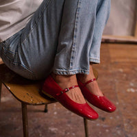 Eloise Red Crinkled Patent Leather Ballerinas, styled with cuffed denim - POEVE Collection
