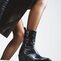 Elow Black Crinkled Glossy Leather Ankle Boots – Campaign Photo – POEVE Collection