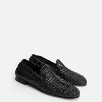 Carola Black Hand-Woven Leather Loafers - Angled Side View - POEVE Collection