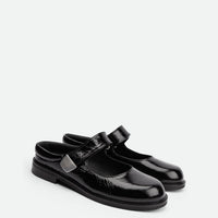 Maris Black Crinkled Patent Leather Mules - Angled Side View - POEVE Collection