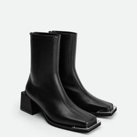 Nora Black Leather Heel Ankle Boots with Metal Detail - Angled Side View - POEVE Collection