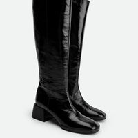 Noelia Black Crinkled Patent Leather Tall Boots - Angled View - POEVE Collection