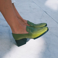 Noemi Green Crinkled Patent Leather Heel Loafers, worn on bare legs - POEVE Collection