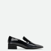 Gwen Pull-Up Black-and-White Leather Loafers – Side View – POEVE Collection