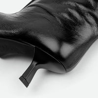 Auree Black Crinkled Glossy Leather Knee-High Boots – Heel Detail View – POEVE Collection
