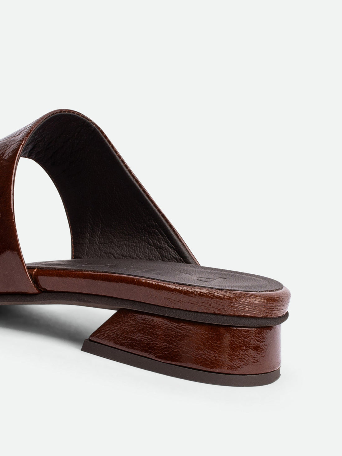 Melanie Brown Crinkled Patent Leather Mules - Heel Close-up View - POEVE Collection