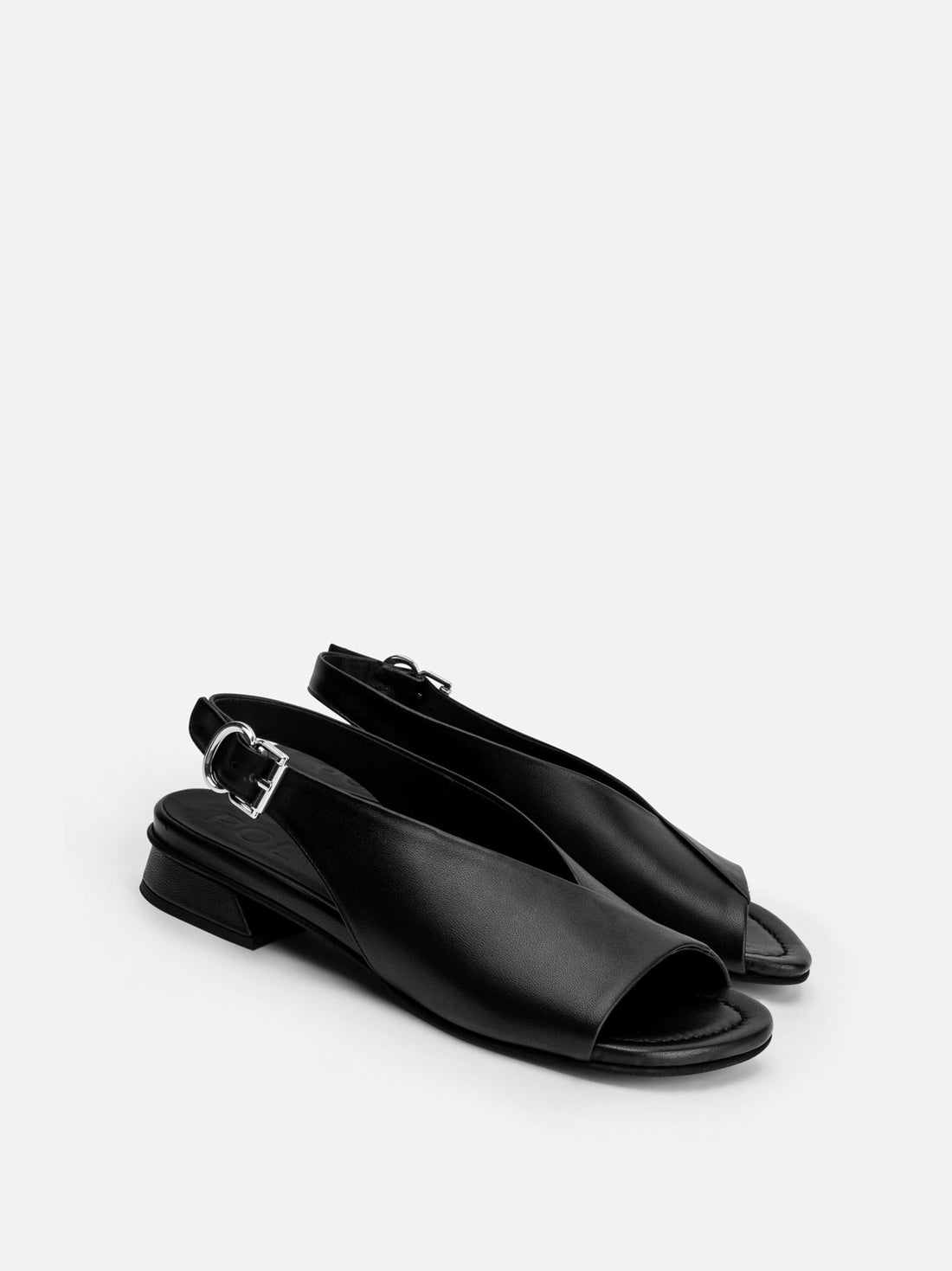Christin Black Leather Slingbacks - Angled Side View - POEVE Collection