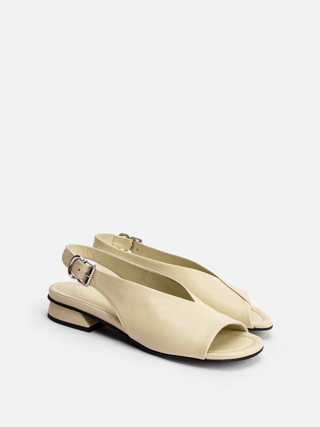 Christin Beige Leather Slingback Sandals - Angled Side View - POEVE Collection