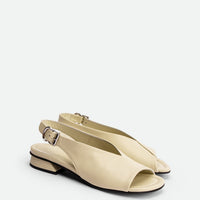 Christin Beige Leather Slingback Sandals - Angled Side View - POEVE Collection