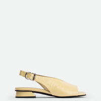 Christin Cream Crinkled Patent Leather Slingbacks - Side View - POEVE Collection
