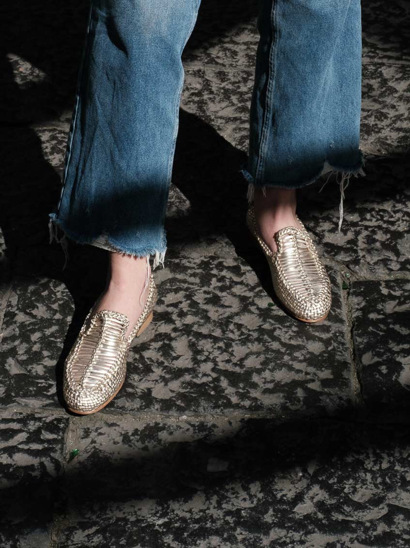 Carola Platinum Laminated Hand-Woven Leather Loafers, styled with frayed hem denim - POEVE Collection