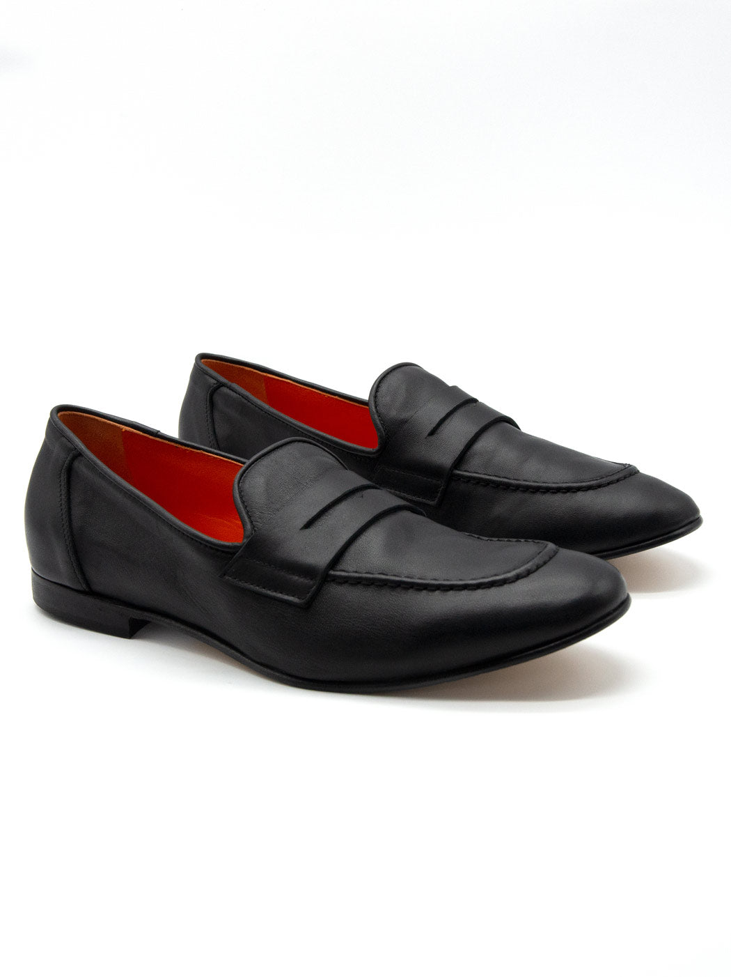 Oscar Black Leather Penny Loafers - Angled Side View - POEVE Collection