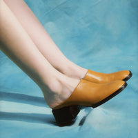 Robin Caramel Crinkled Patent Leather Heel Mules, worn on bare legs - POEVE Collection