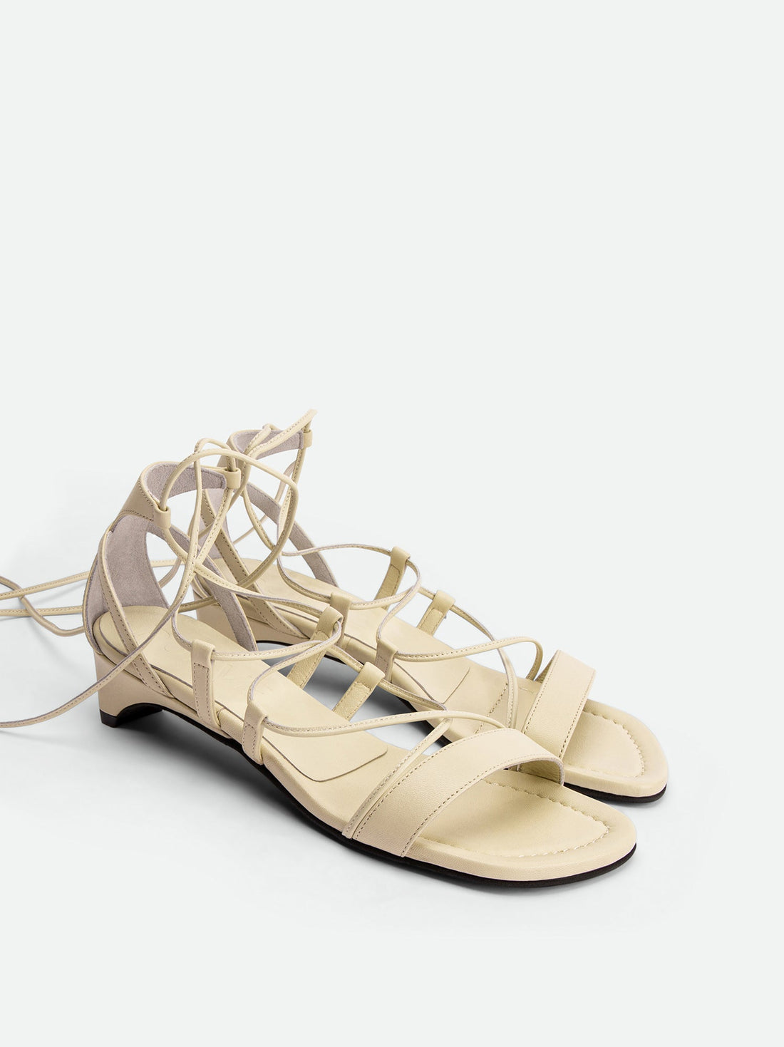 Muse Beige Leather Heel Lace-up Sandals - Angled Side View - POEVE Collection