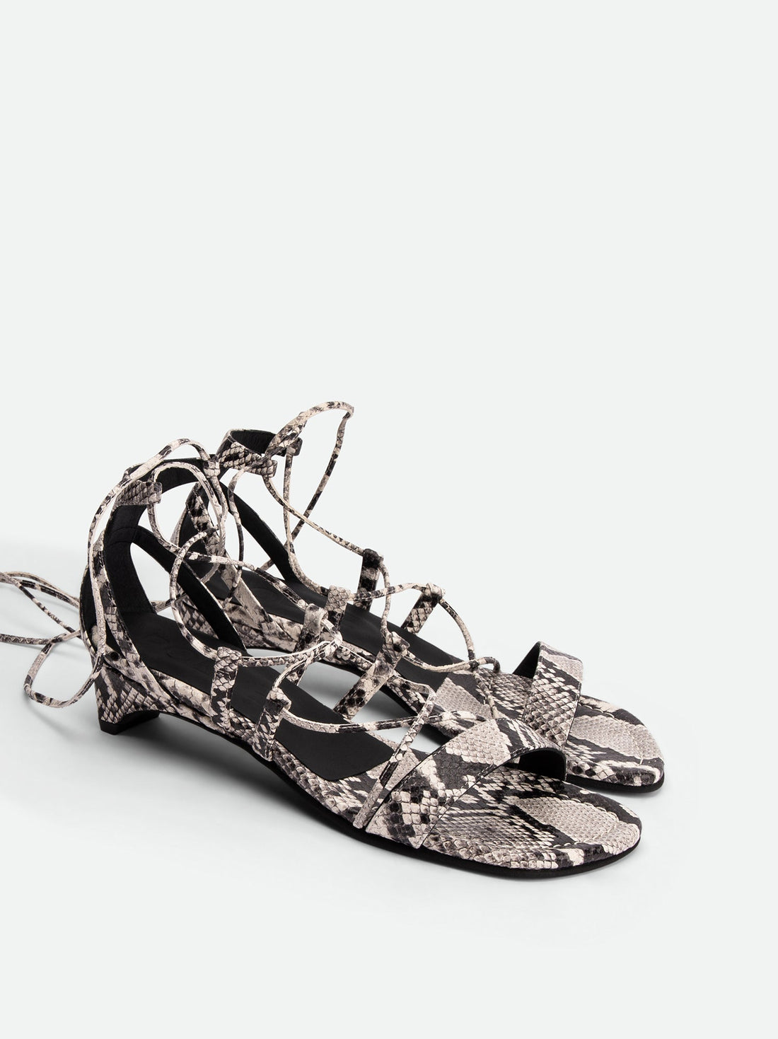 Muse Snake-embossed Leather Heel Lace-up Sandals - Angled Side View - POEVE Collection