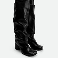Hazel Black Leather Heel Tall Boots - Angled Side View - POEVE Collection