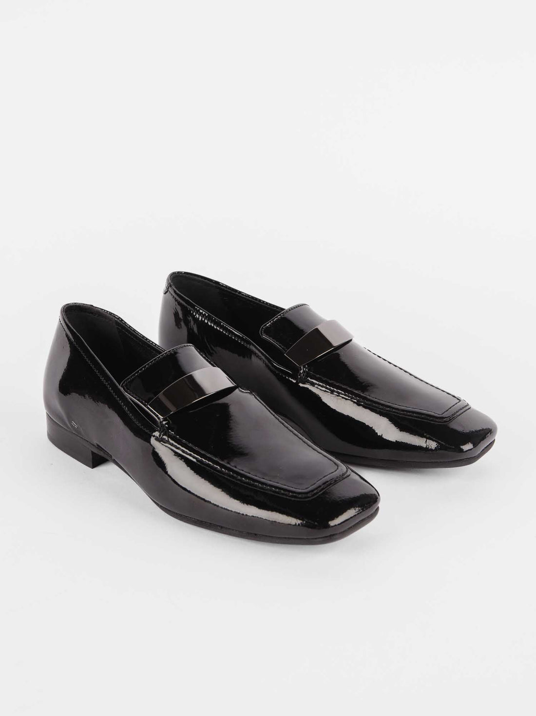 Valentina Black Patent Leather Loafers with Metal Accessory - Angled Side View - POEVE Collection