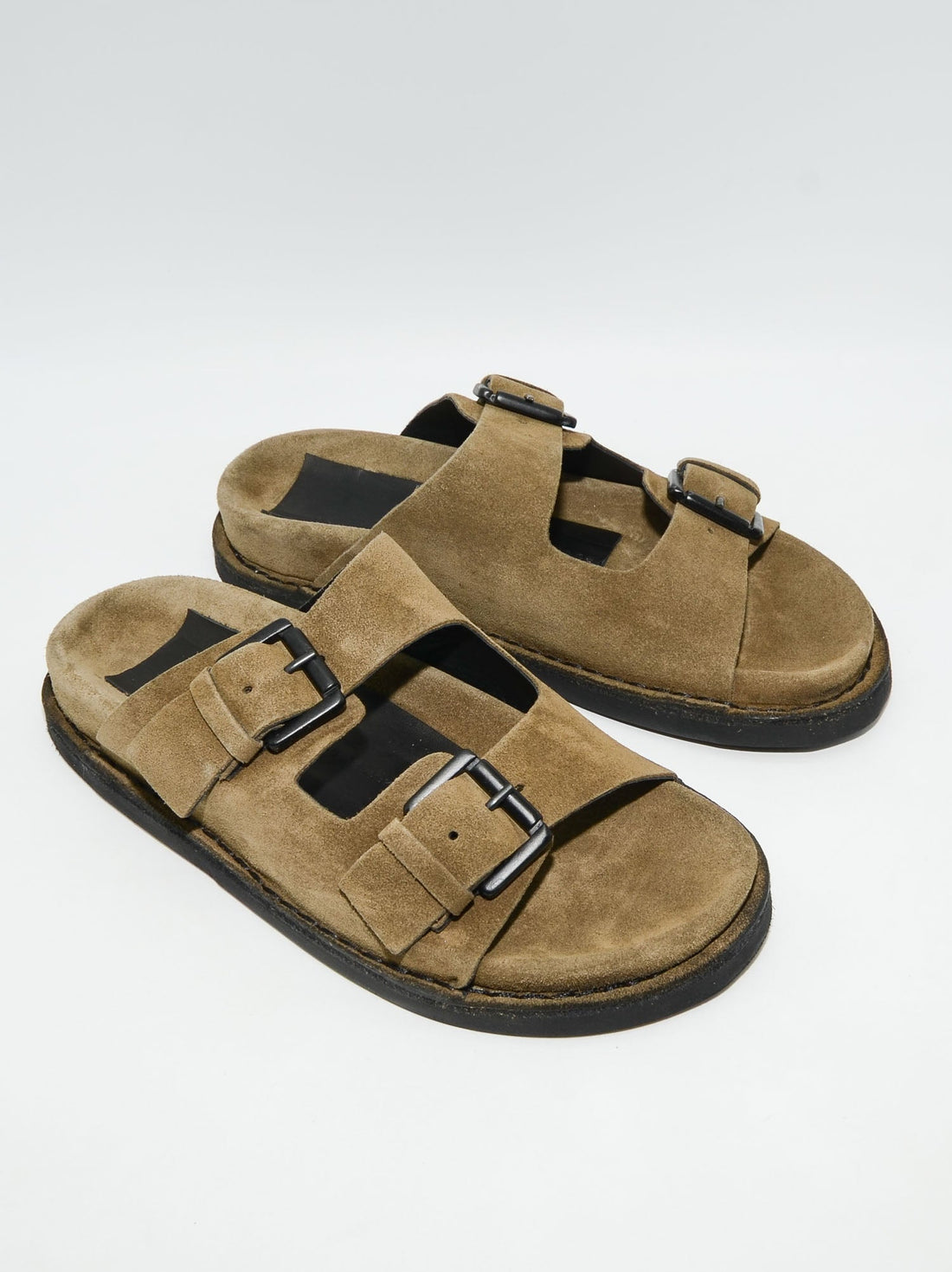 Rory Brown Crust Leather Mules with Metal Buckles - Three-Quarters View - POEVE Collection
