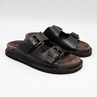 Rory Black Leather Mules with Metal Buckles - Angled Side View - POEVE Collection