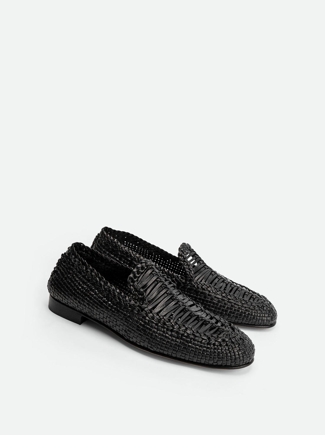Carola Black Hand-Woven Leather Loafers - Angled Side View - POEVE Collection