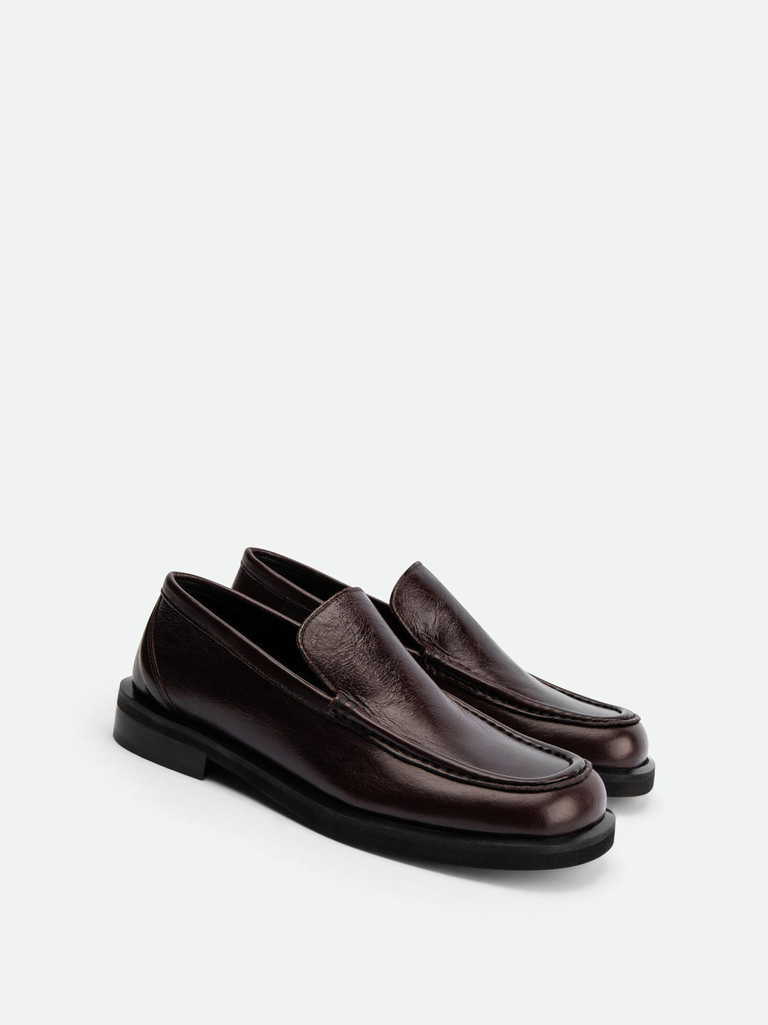 Dannie Dark Brown Leather Loafers – Angled View – POEVE Collection