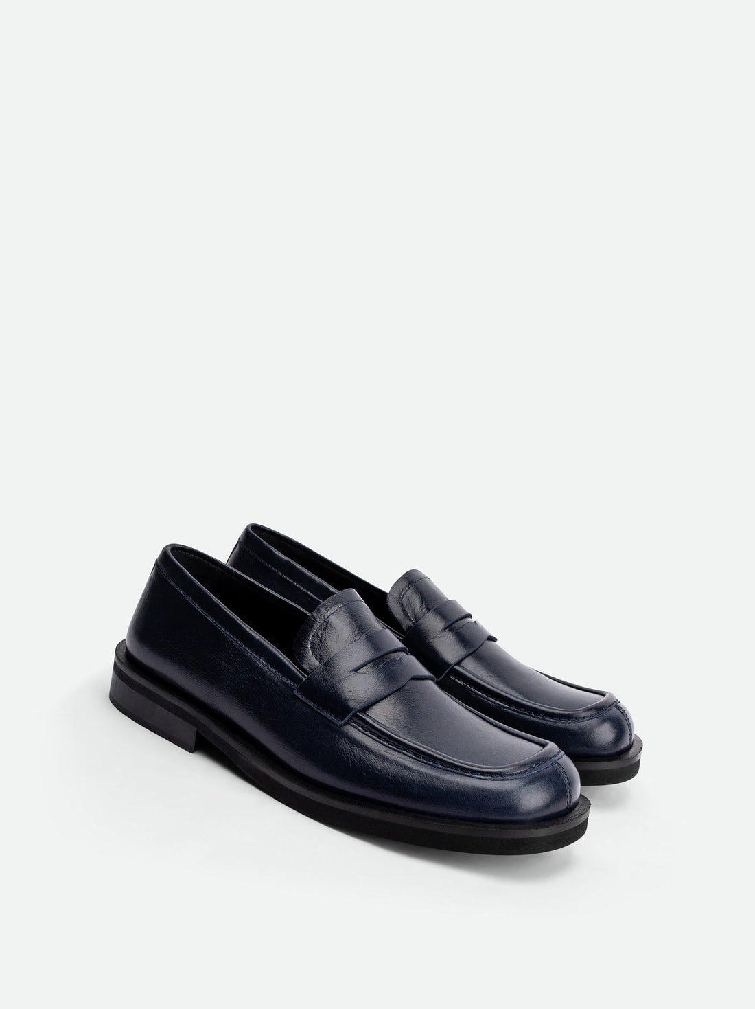 Senna Navy Blue High-Gloss Crinkled Leather Loafers – Angled View – POEVE Collection