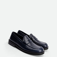 Senna Navy Blue High-Gloss Crinkled Leather Loafers – Angled View – POEVE Collection