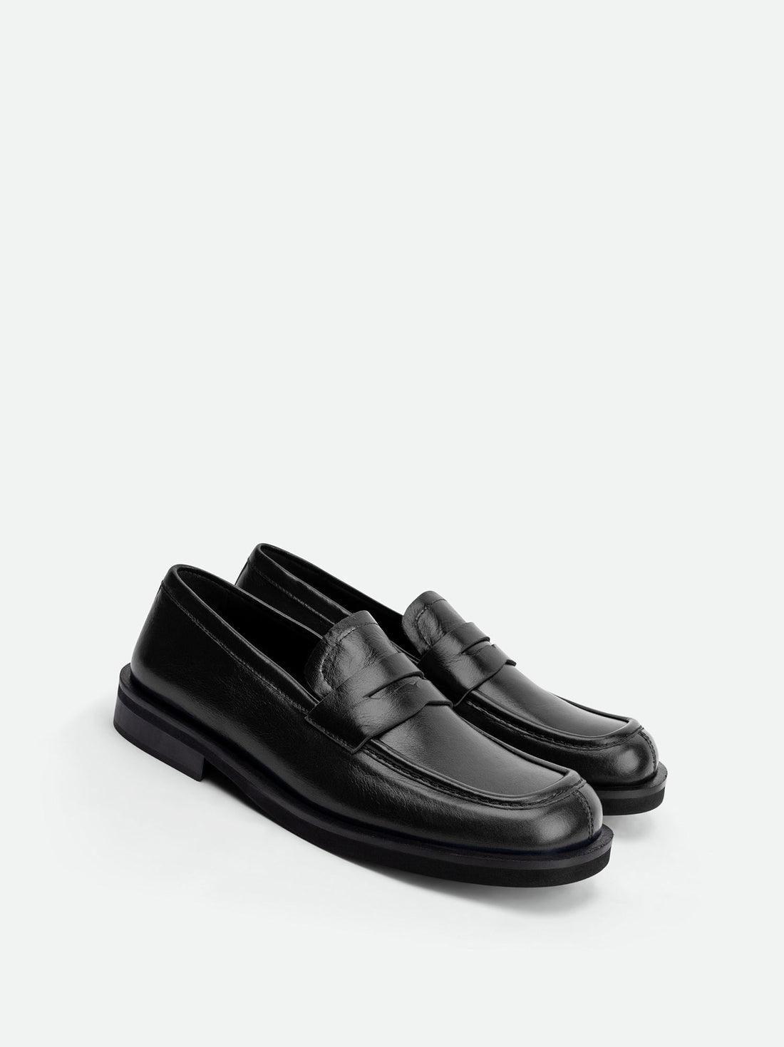 Senna Black High-Gloss Crinkled Leather Loafers – Angled View – POEVE Collection