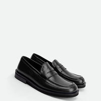 Senna Black High-Gloss Crinkled Leather Loafers – Angled View – POEVE Collection