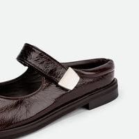 Maris Brown Crinkled Patent Leather Mules - Side Close-up View - POEVE Collection