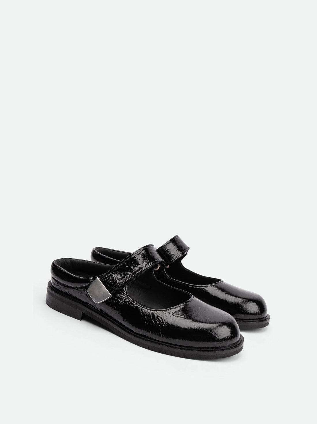 Maris Black Crinkled Patent Leather Mules - Angled Side View - POEVE Collection