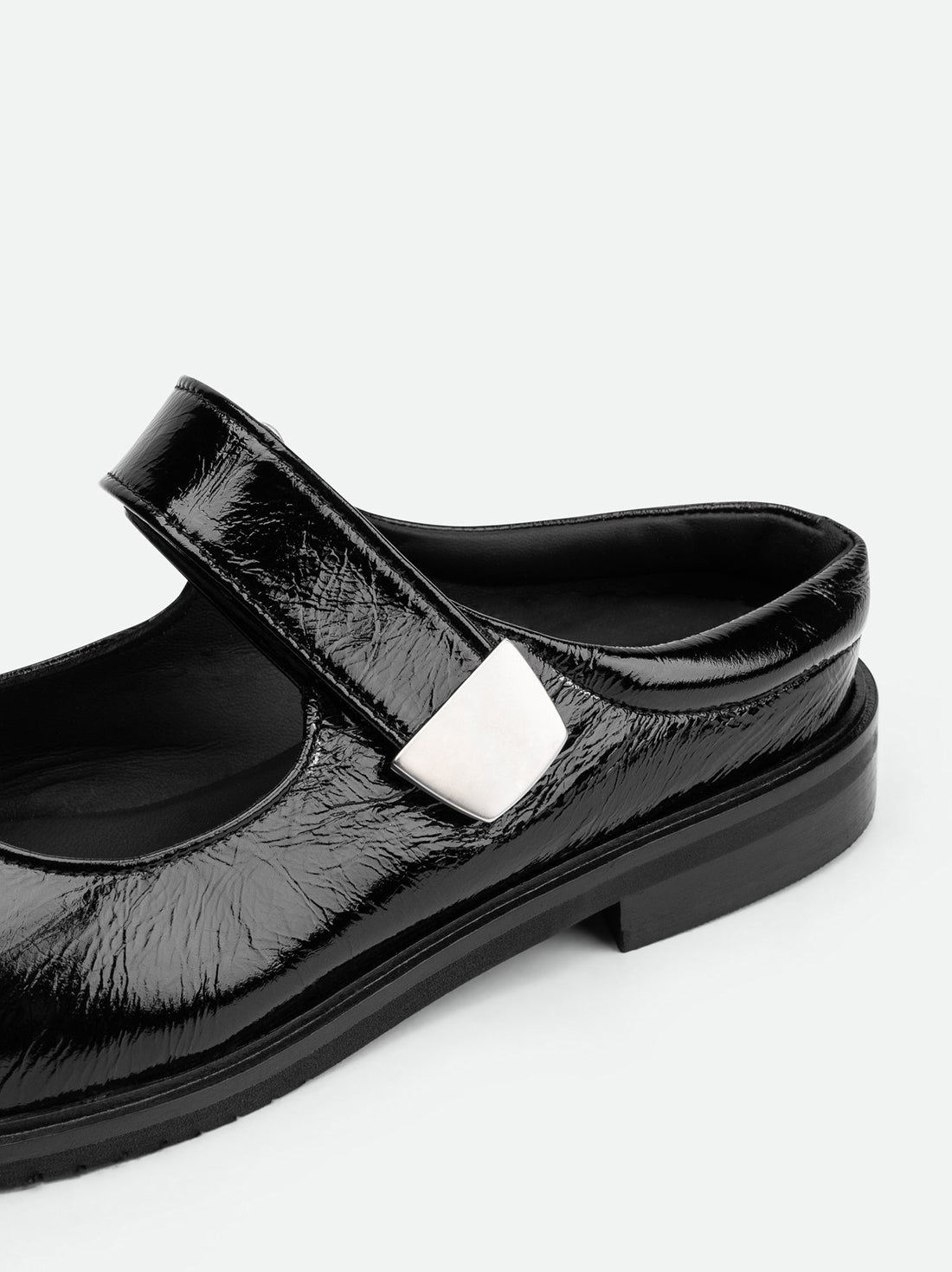 Maris Black Crinkled Patent Leather Mules - Side Close-up View - POEVE Collection