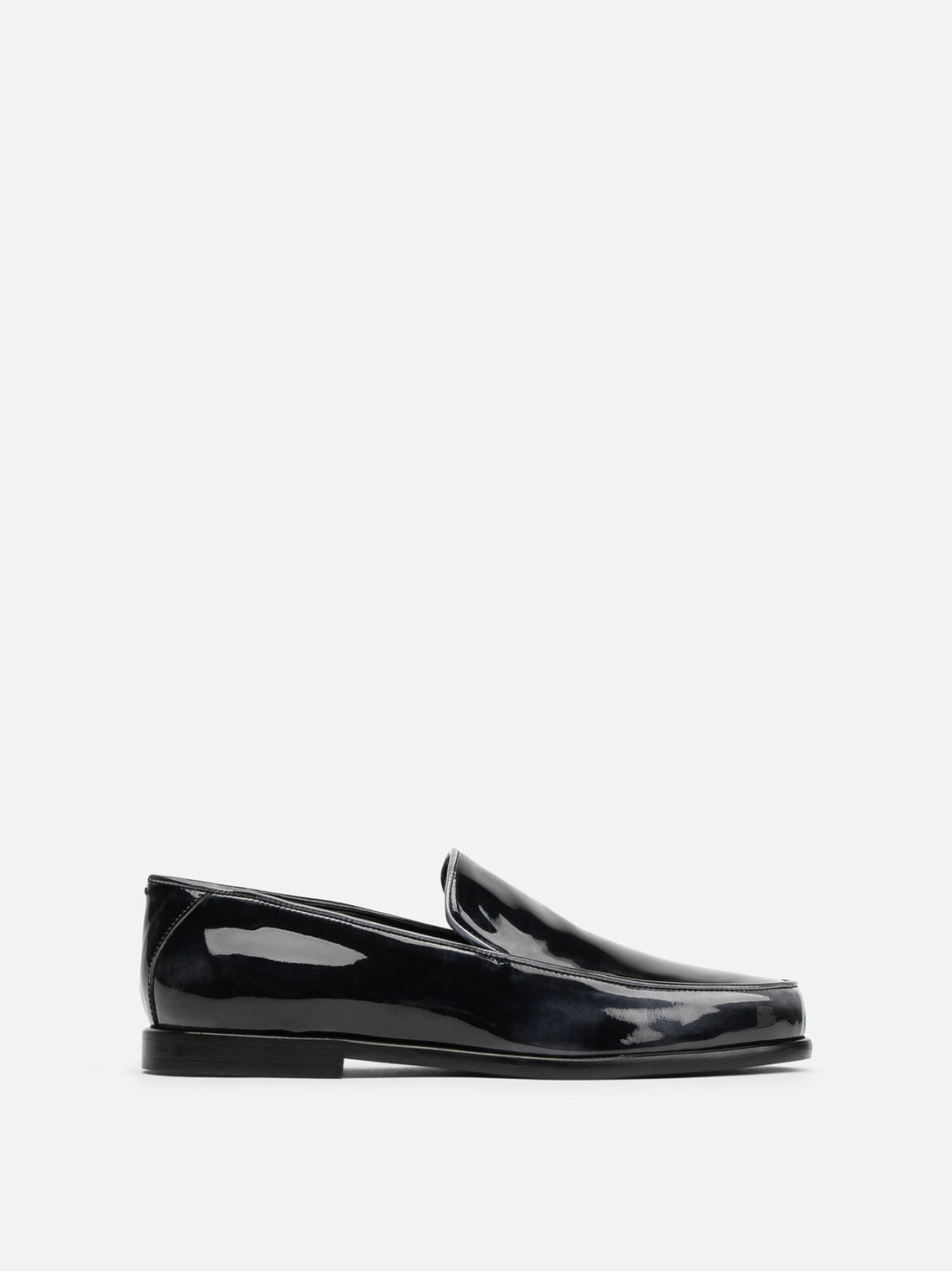 Nida Pull-Up Black-and-White Leather Loafers – Side View – POEVE Collection