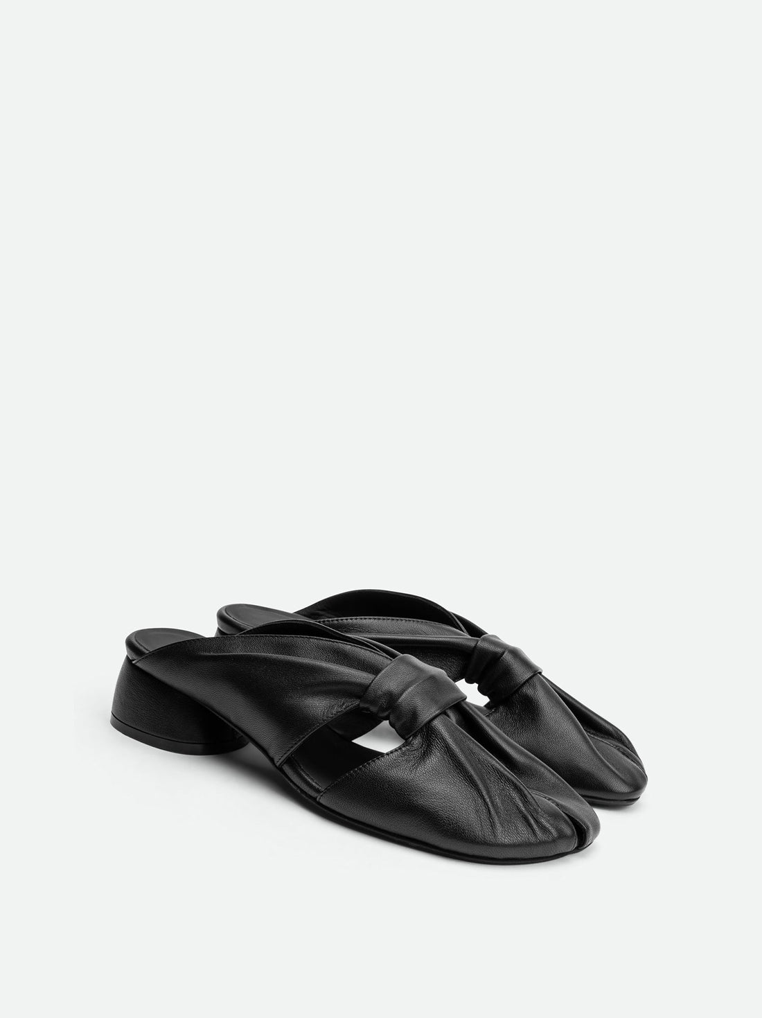 Maggie Black Leather Mules - Angled Side View - POEVE Collection