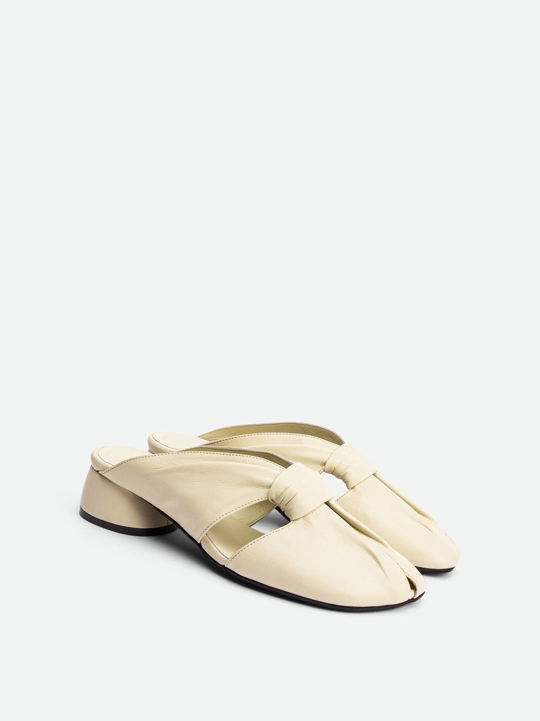 Maggie Beige Leather Mules - Angled Side View - POEVE Collection