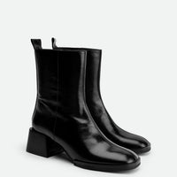 Angie Black Leather Ankle Boots - Angled View - POEVE Collection