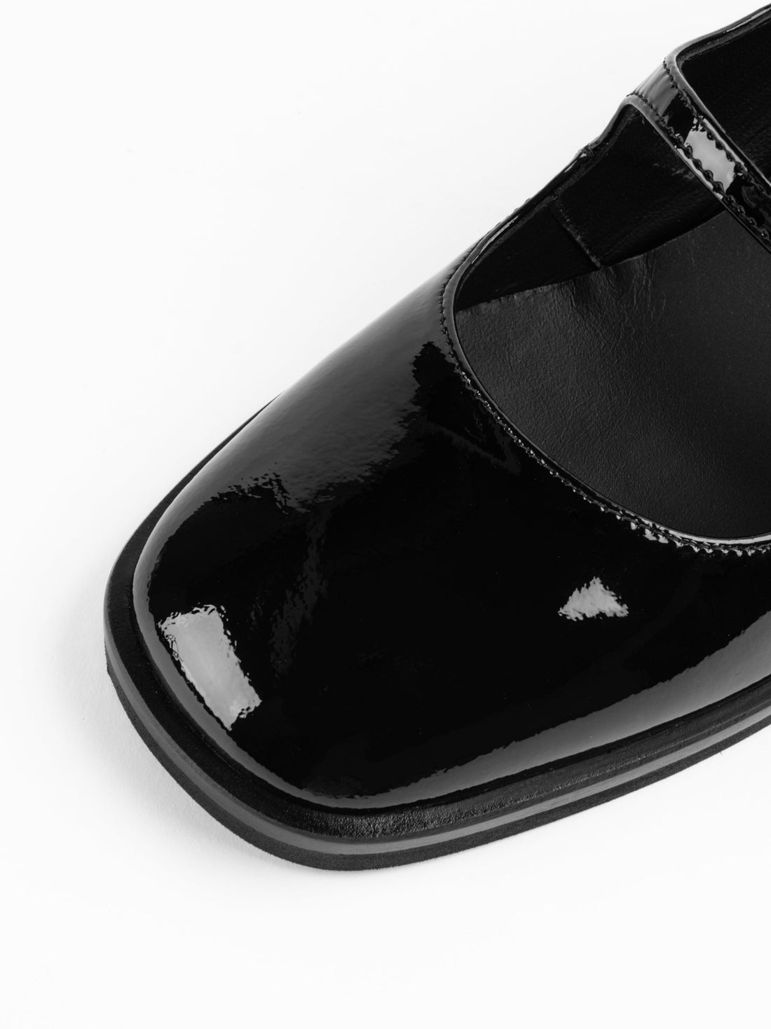 Maven Black Patent Leather Heel Shoes with Metal Buckles - Toe Close-up View - POEVE Collection