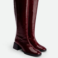 Noelia Red Crinkled Patent Leather Tall Boots - Angled Side View - POEVE Collection