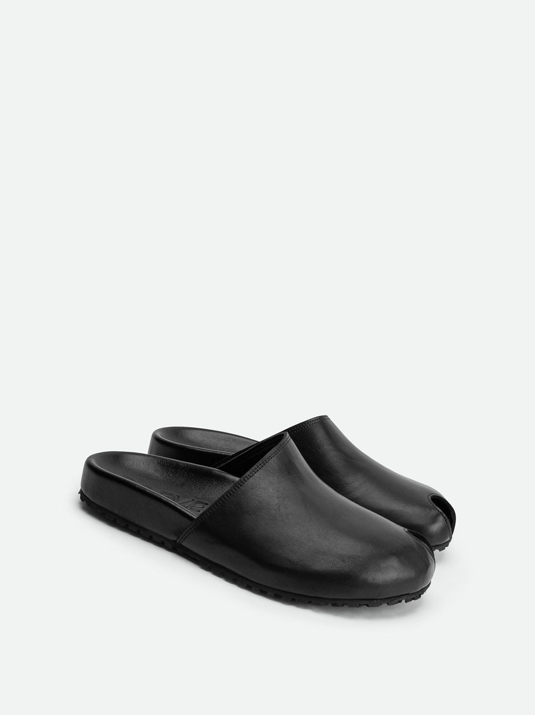 Olga Black Leather Mules - Angled Side View - POEVE Collection