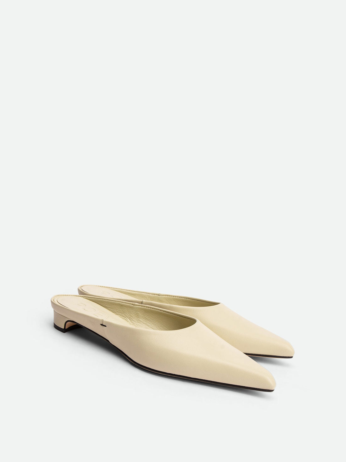 Faye Beige Leather Mules - Angled Side View - POEVE Collection