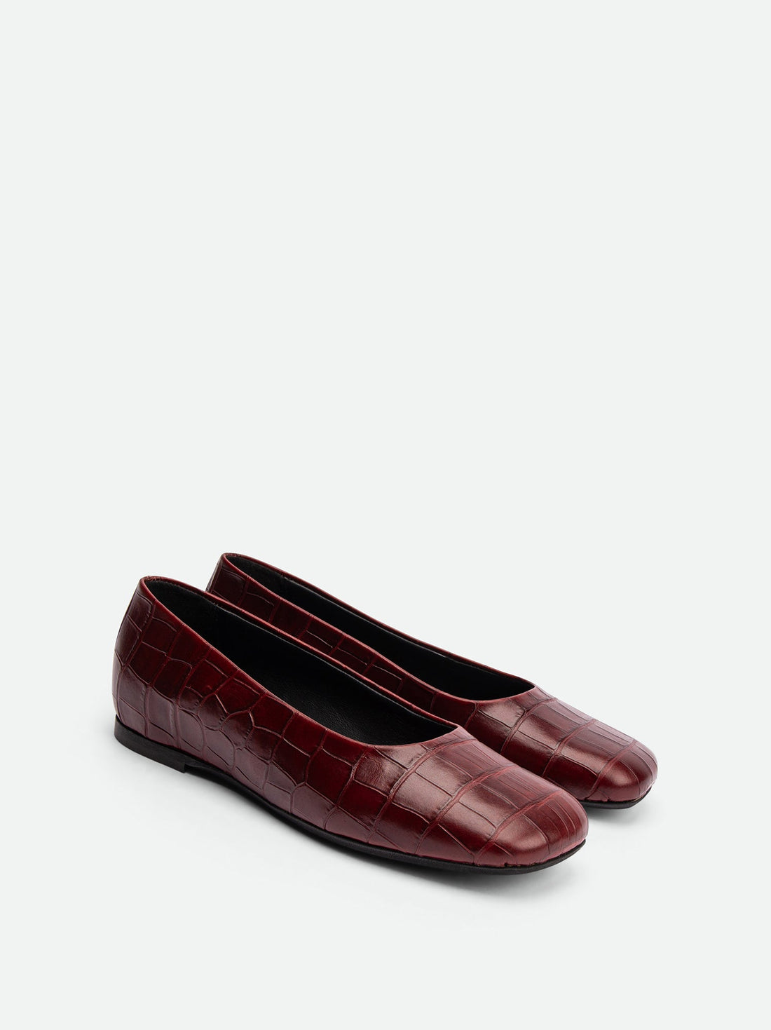 Emery Brick Red Crocodile-Print Leather Ballerinas – Angled View – POEVE Collection