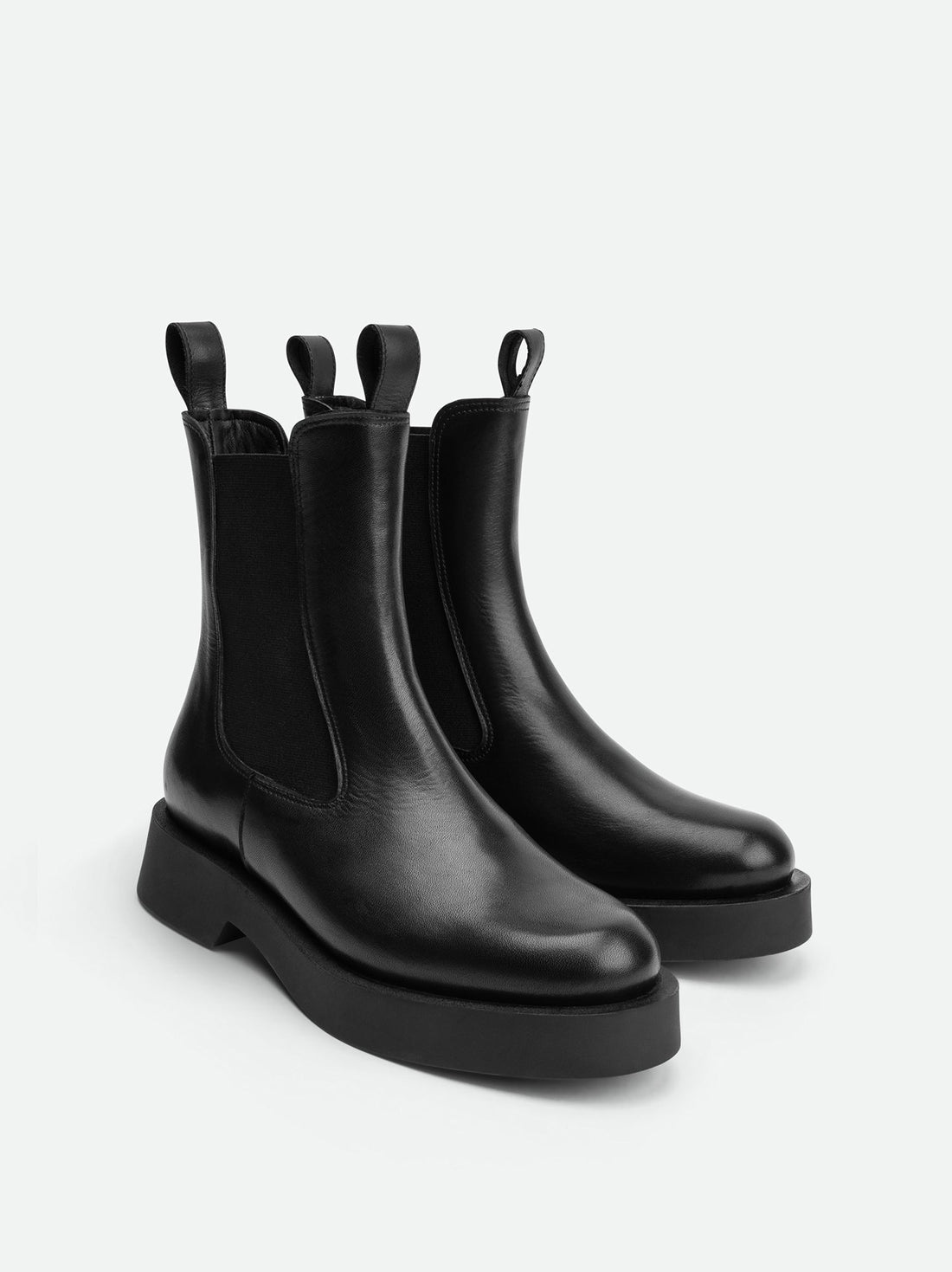 Nyx Black Leather Ankle Boots – Angled Side View – POEVE Collection