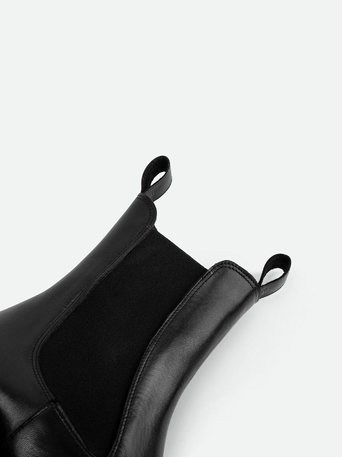 Nyx Black Leather Ankle Boots – Close-up Side View – POEVE Collection