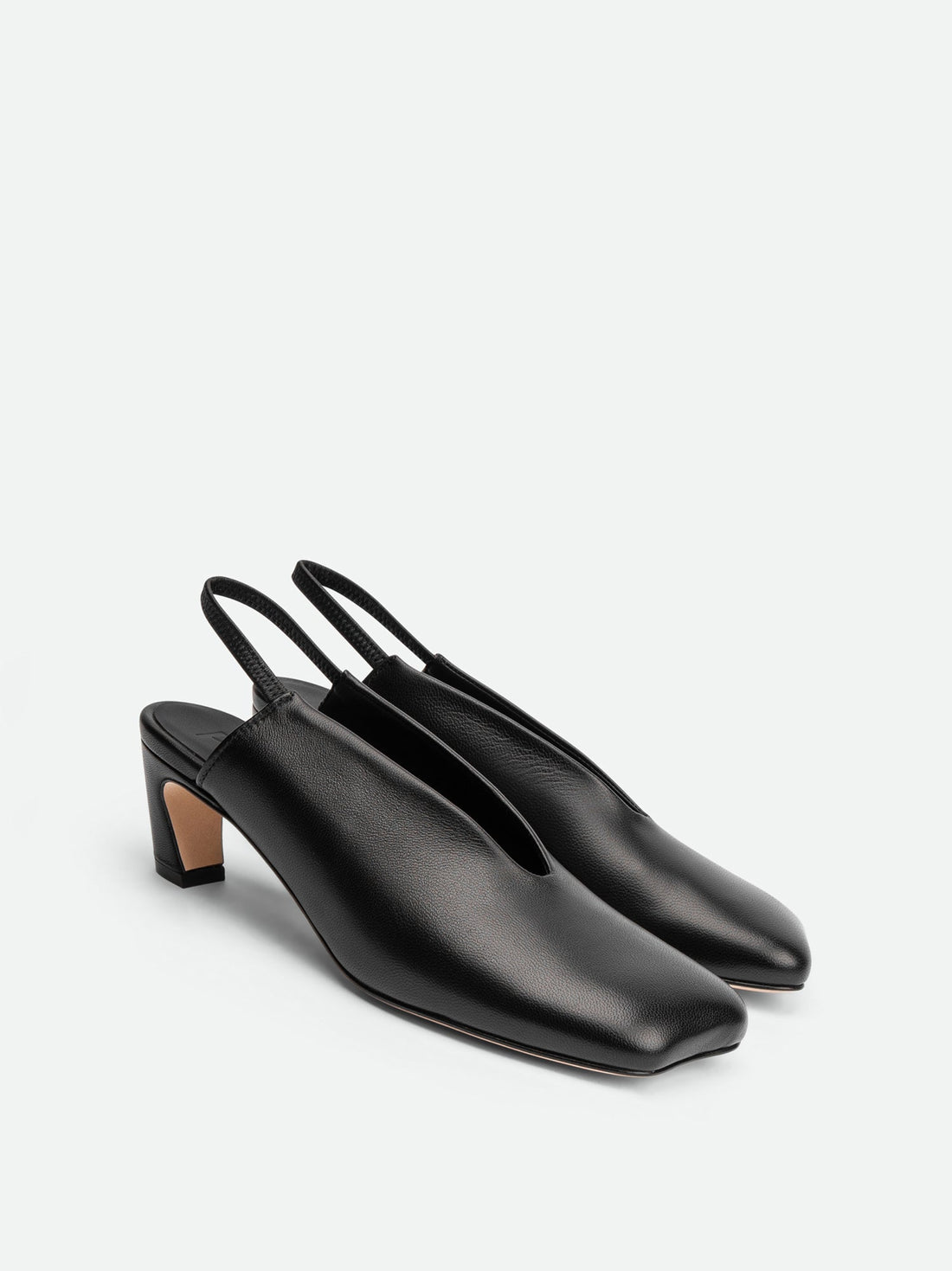 Elisa Black Leather Heel Slingbacks - Angled Side View - POEVE Collection